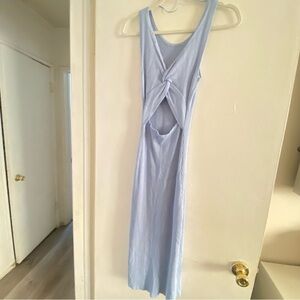 Stretchy long Maci dress with no sleeves and open cut out in the front center